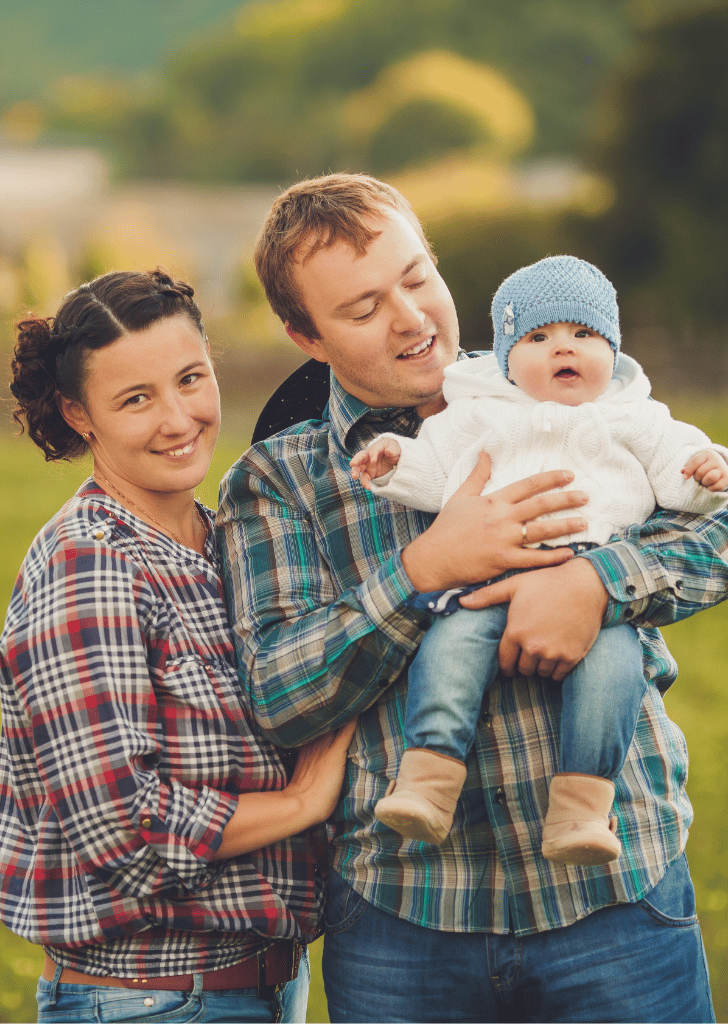 Young happy family having fun at countryside